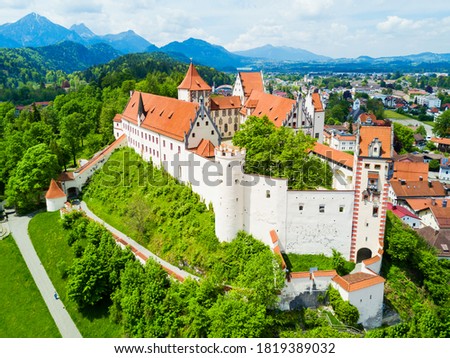 Hohes Schloss Fussen or Gothic High Castle of the Bishops aerial panoramic view, Germany. Hohes Schloss lies on a hill above Fuessen old town in Swabia. Royalty-Free Stock Photo #1819389032