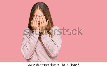 Beautiful blonde woman wearing casual winter pink sweater rubbing eyes for fatigue and headache, sleepy and tired expression. vision problem 