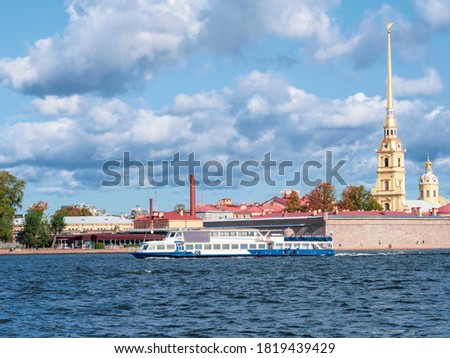 Beautiful view of the Peter and Paul fortress with ship from the Neva river in Saint Petersburg.