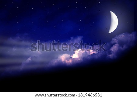 Night beautiful landscape of the moon on the starry sky with a small cloud.