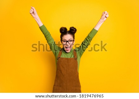 Photo of ecstatic crazy student female university geek nerd achieve a-level exam raise fists scream wear green style stylish trendy sweater isolated over bright shine color background