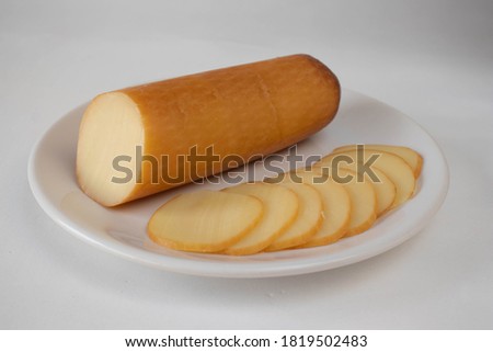 Provolone cheese on a plate Royalty-Free Stock Photo #1819502483