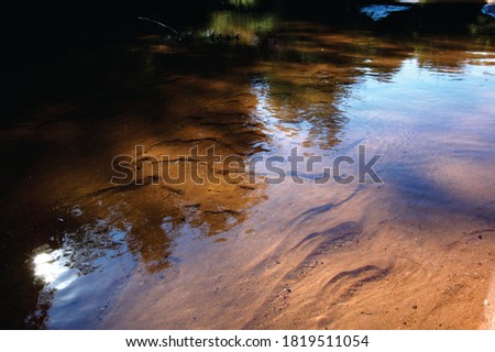 Calm River With Pattern Sand