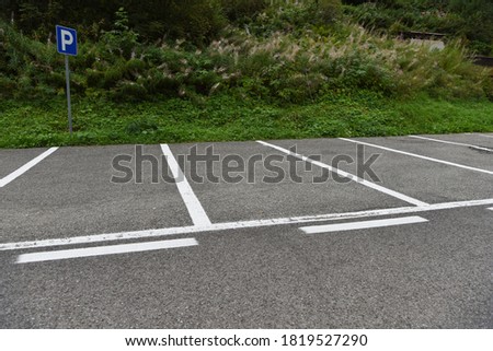 parking for cars with billboard