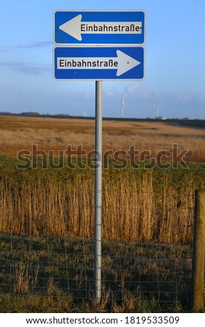 German "Einbahnstraße" (one way) street sign in both directions