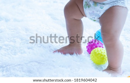 Baby legs isolated on white background

