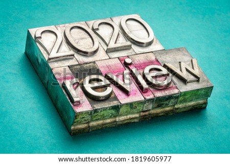 2020 year review word abstract  word abstract in gritty vintage letterpress metal types, business concept