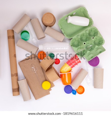 recycled craft ideas for kids, use of toilet paper rolls and other materials for creative projects, flat lay, white background, top view Royalty-Free Stock Photo #1819616111