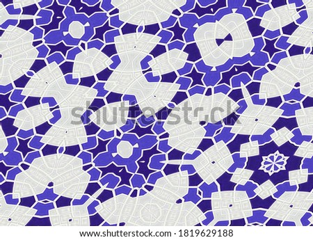 Ceramic mosaic in the bathroom, in white and royal blue mandala ornamment design background.