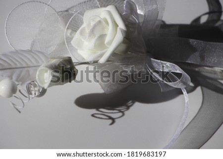 white rose decoration close up on white background. Present box close up. 