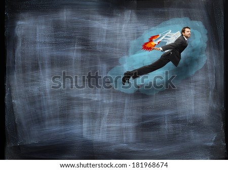Businessman flying with rocket backpack