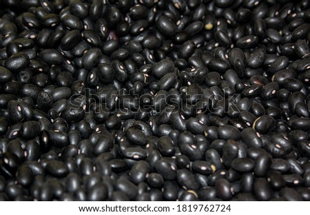 
Pile of raw and dried black beans