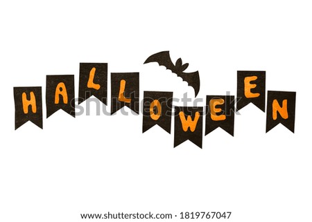 Happy Halloween with cut out letters, paper bat and other decorations isolated on white. paper art, halloween with kids concept