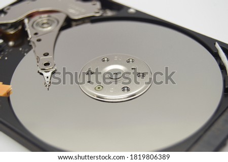 Close-up of internal hard disk parts, recovery and backup concept.