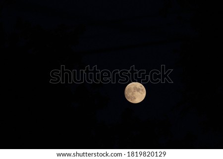 Moon Hanging in Night Sky