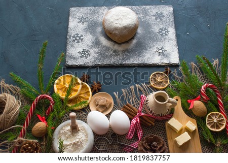 Ingredients for cooking flour, sugar, eggs, butter, spice, orange top view Flat lay