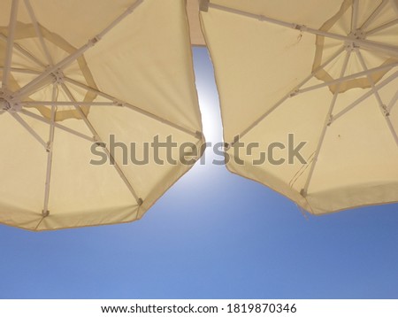 two umbrellas on the sky