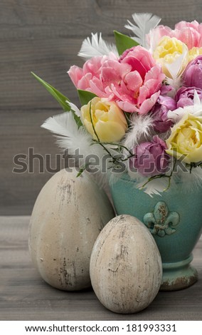 colorful tulip flowers with vintage easter eggs decoration