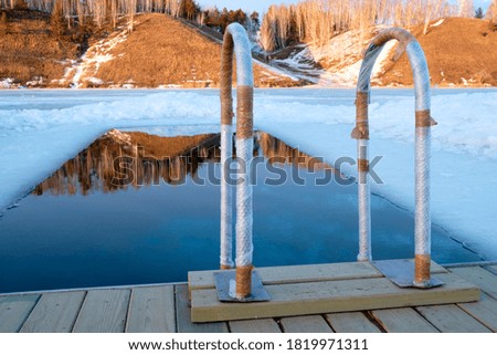 handrails for launching, for those who are tempered and swim in winter. ice hole