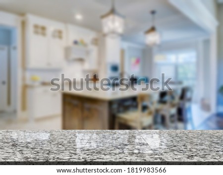 Empty wood table top and modern blurred kitchen window background
