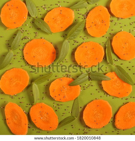 sliced carrots lie on a bright background