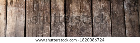 Wood planks texture as background or wallpaper. View from above. Place for text. Photo banner.