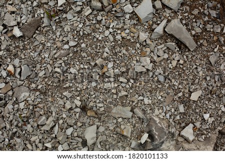 Shale stone texture. Many gray broken stones.