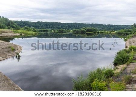 Midsummer. Water storage on the Protva River in Russia. A great place for boating and fishing.