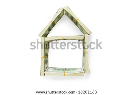 Form of house made of American dollars over white background