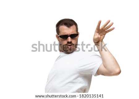 Man on white studio background, funny meme emotions Royalty-Free Stock Photo #1820135141