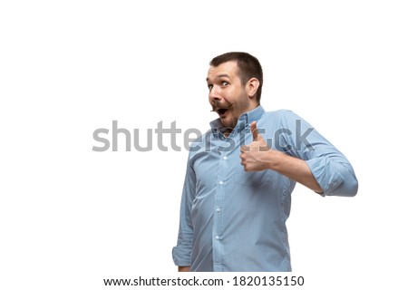 Man on white studio background, funny meme emotions Royalty-Free Stock Photo #1820135150