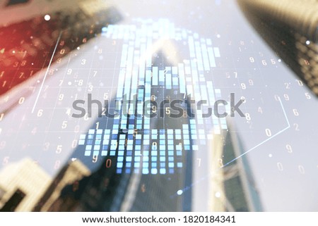 Double exposure of creative Bitcoin symbol hologram on blurry cityscape background. Mining and blockchain concept