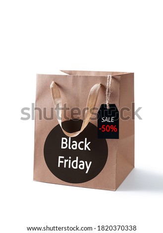 Mock-up Black Friday. Shopping Paper Bag on White Background. Concept Big Sale