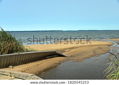 A view of the Chesapeake Bay from Terrapin Nature Park Royalty-Free Stock Photo #1820545253
