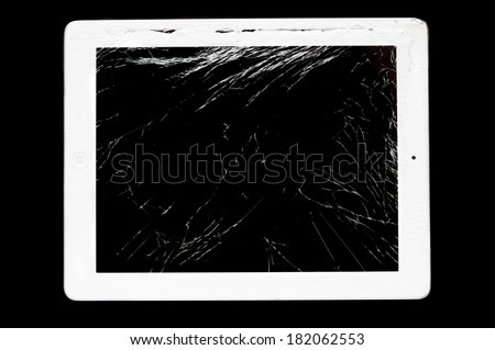 tablet computer with broken glass screen isolated on black background