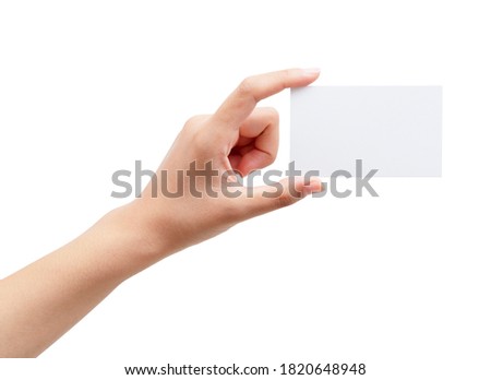 A woman's hand holding a plain business card on a white background