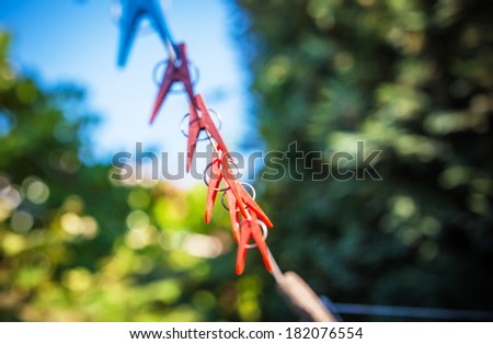 clothespins on a rope in the yard