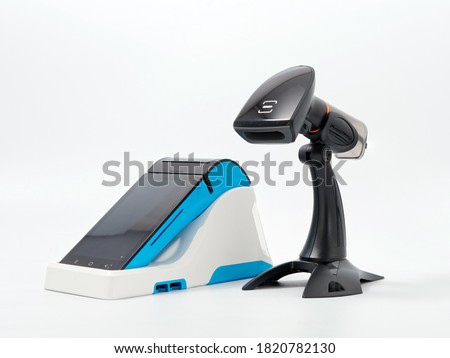 stylish portable cash register with stand GR code scanner on white background