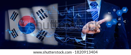 Businessman touching data analytics process system with KPI financial charts, dashboard of stock and marketing on virtual interface. With South Korea flag in background.