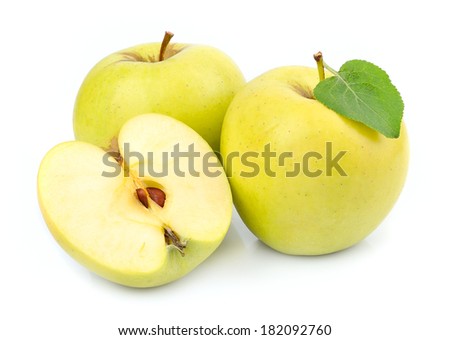 Fresh apples with leaves isolated on white background