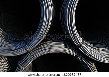 metal cables in huge rolls macro photo. industrial cable
