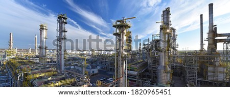 pipeline,storage tanks and buildings of a refinery - industrial plant for fuel production 