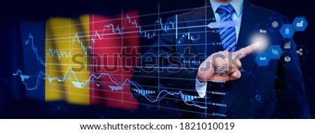 Businessman touching data analytics process system with KPI financial charts, dashboard of stock and marketing on virtual interface. With Romania flag in background. Royalty-Free Stock Photo #1821010019