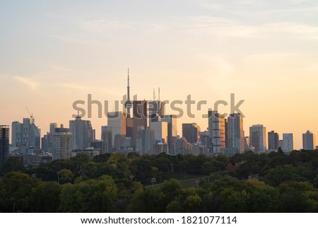 Toronto City Skyline at sunset from Riverdale Park in Ontario Canada