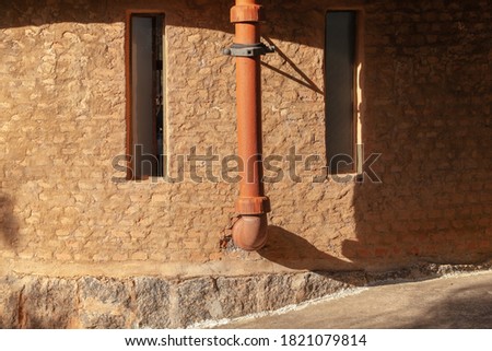 Pareidolia face house brick wall