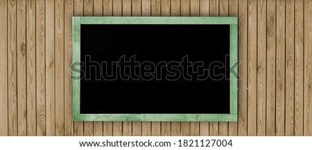 front view chalkboard on wooden wall 
