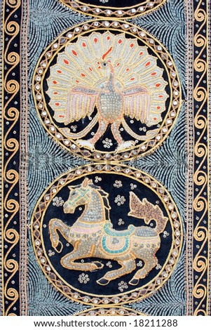 Vintage colorful carpet with Bird Phoenix and Pegasus useful for background  (Flea Market, Tel-Aviv).