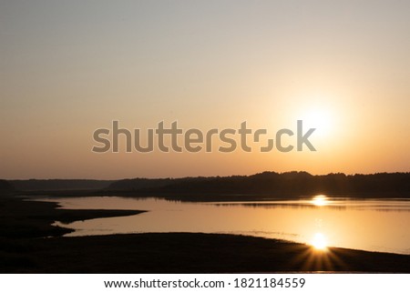 A beautiful picture of the river on the autumn evening. Sunset, landscape photography, Russia