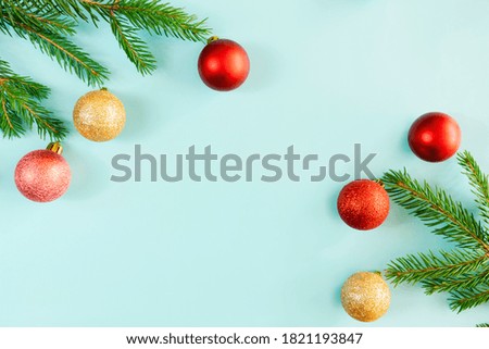 New Year decorations on a blue background. Christmas ornaments. Flat lay. Concept.