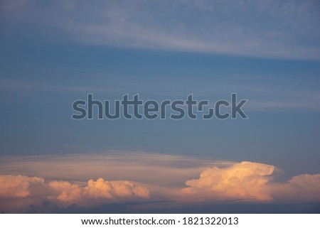 Beautiful sunset sky and clouds with dramatic light, Twilight sky and sun rays, Orange and red sky background with light of the sun-Image
